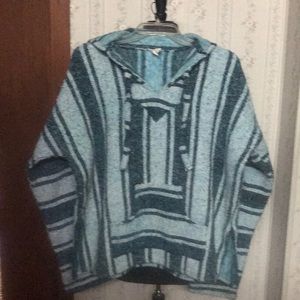 Hooded pullover dark blue striped with multi color blues and white.Unisex